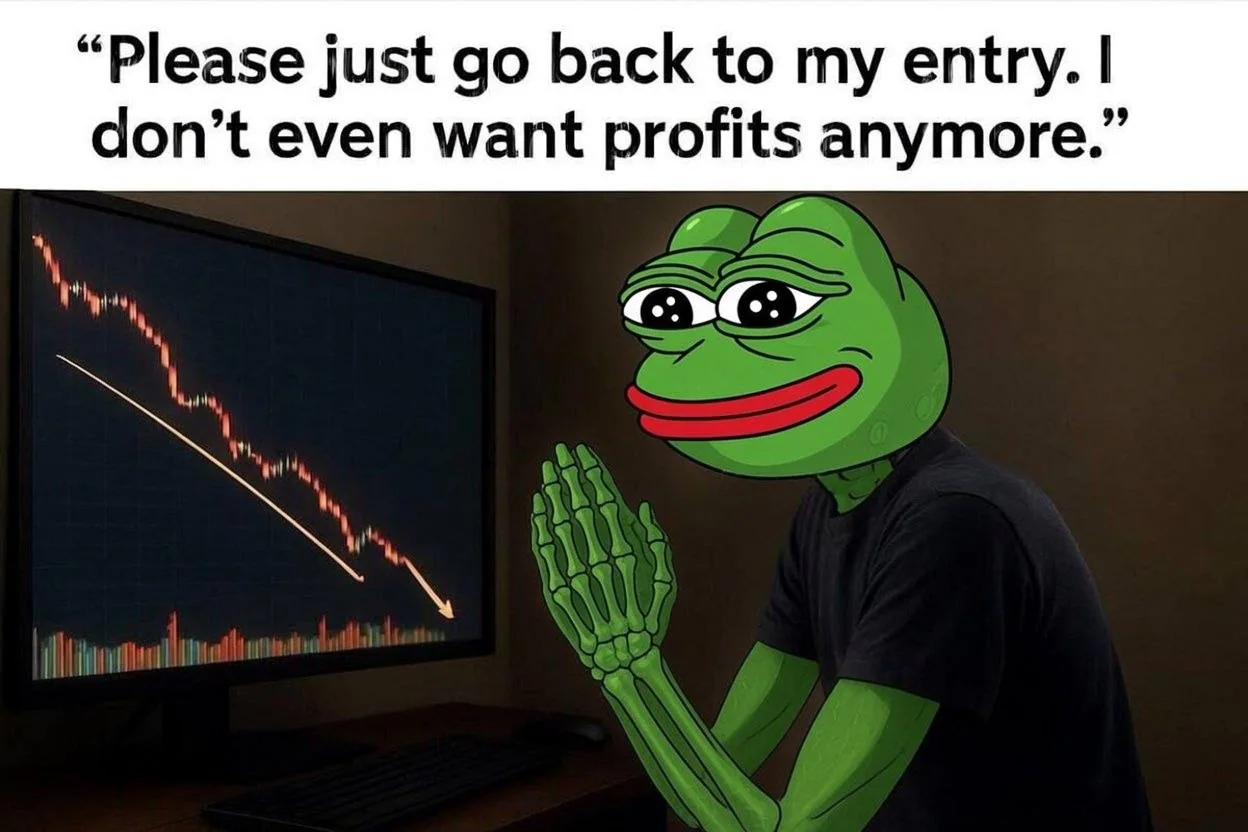 A frog praying beside a falling chart and asking price to return to the original entry.